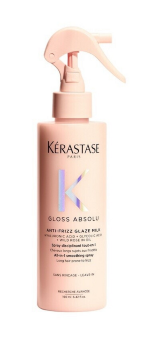 Kérastase Gloss Absolu hair care product with spray nozzle on a white background
